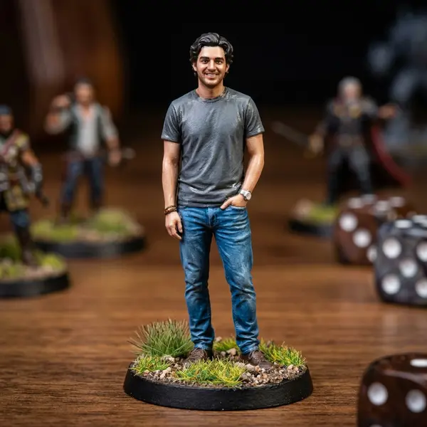 Photo of a man edited into a tabletop miniature figurine